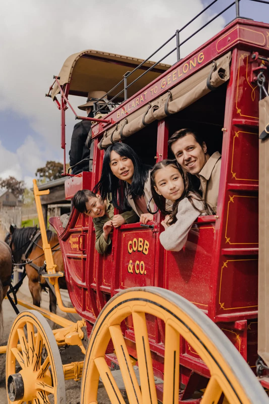Family in horse-drawn carriage