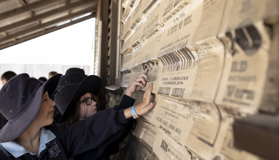 Children looking at posters