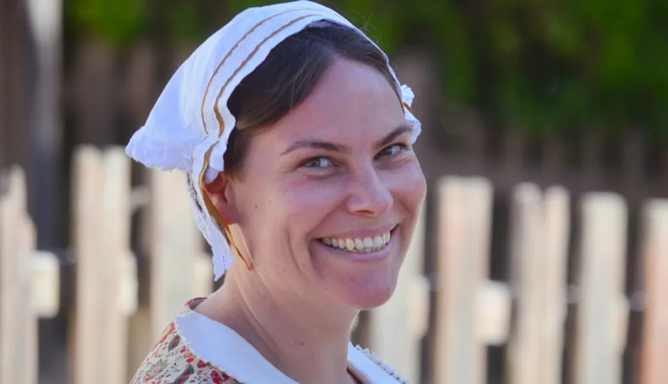 Woman in costume smiling