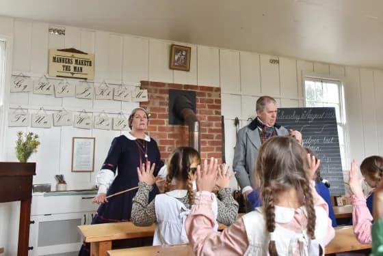 Children in costumes in school