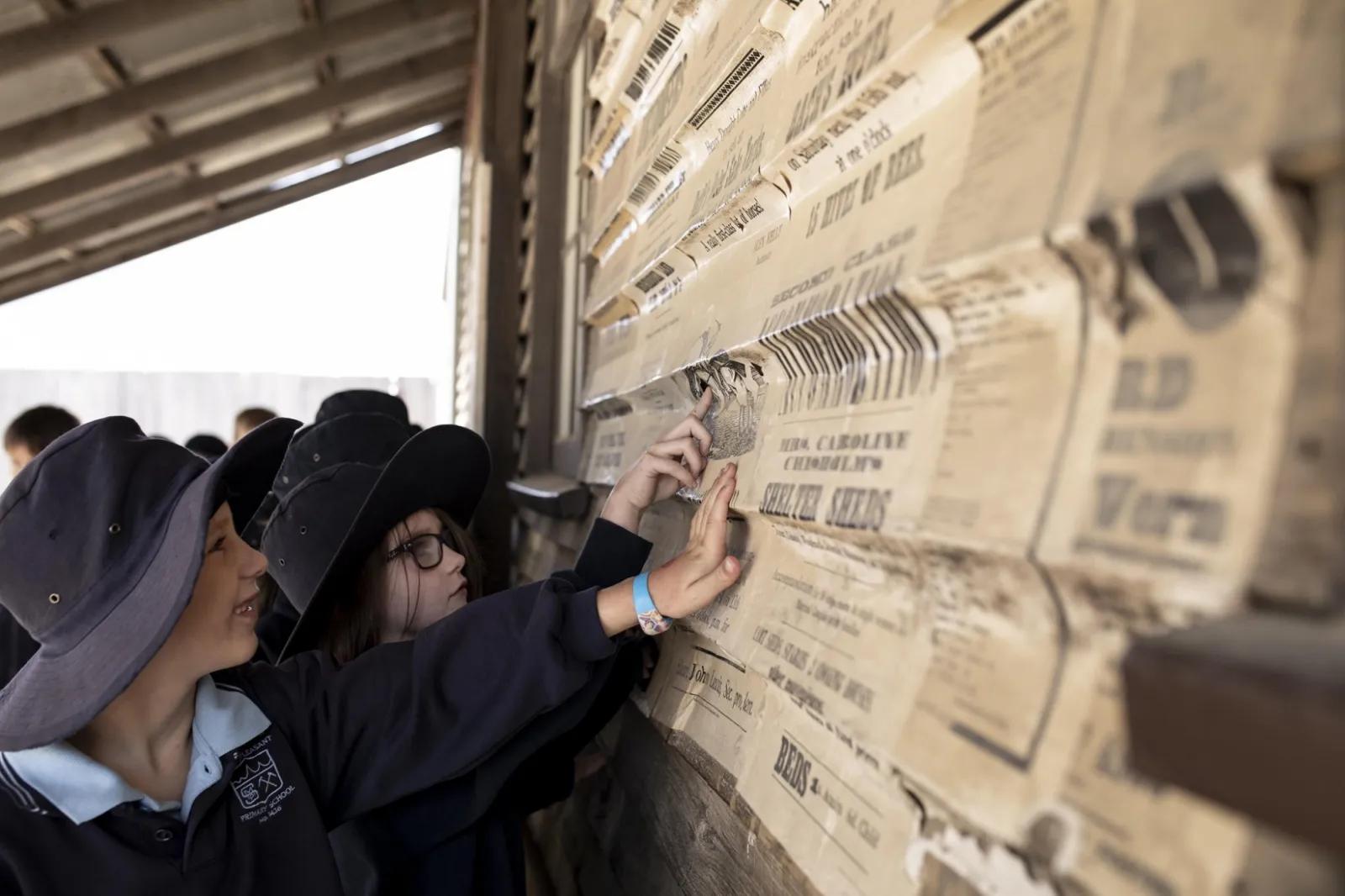 Children looking at posters