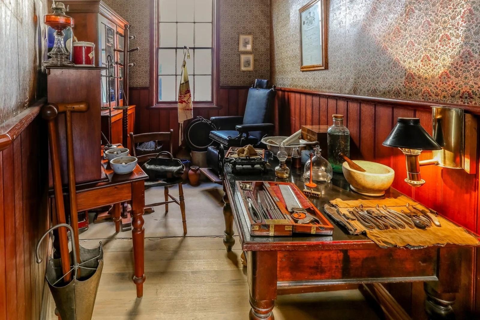 Authentic gold rush era doctor’s surgery with antique medical tools, furniture, and equipment on display, from Australia’s most visited outdoor museum and heritage attraction.