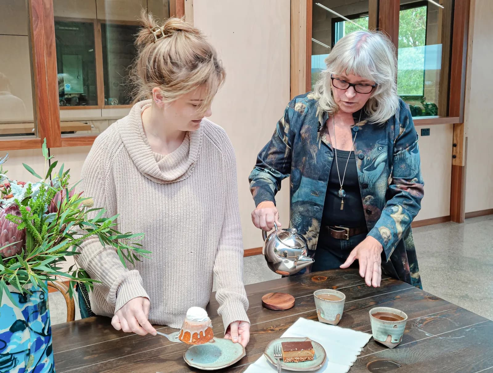 Women having coffee and cake