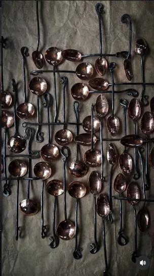 Hand-forged metal spoons displayed together, showcasing traditional blacksmithing craftsmanship at Sovereign Hill.