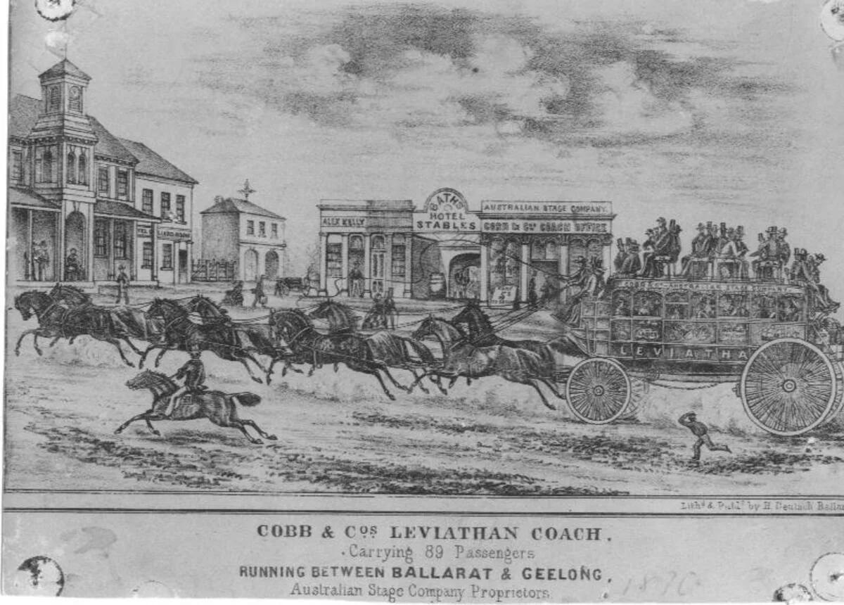 Historic illustration of Cobb & Co’s Leviathan coach carrying passengers between Ballarat and Geelong, drawn by multiple horses through a town street.