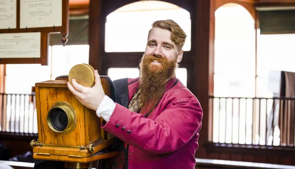 Man with old fashion camera